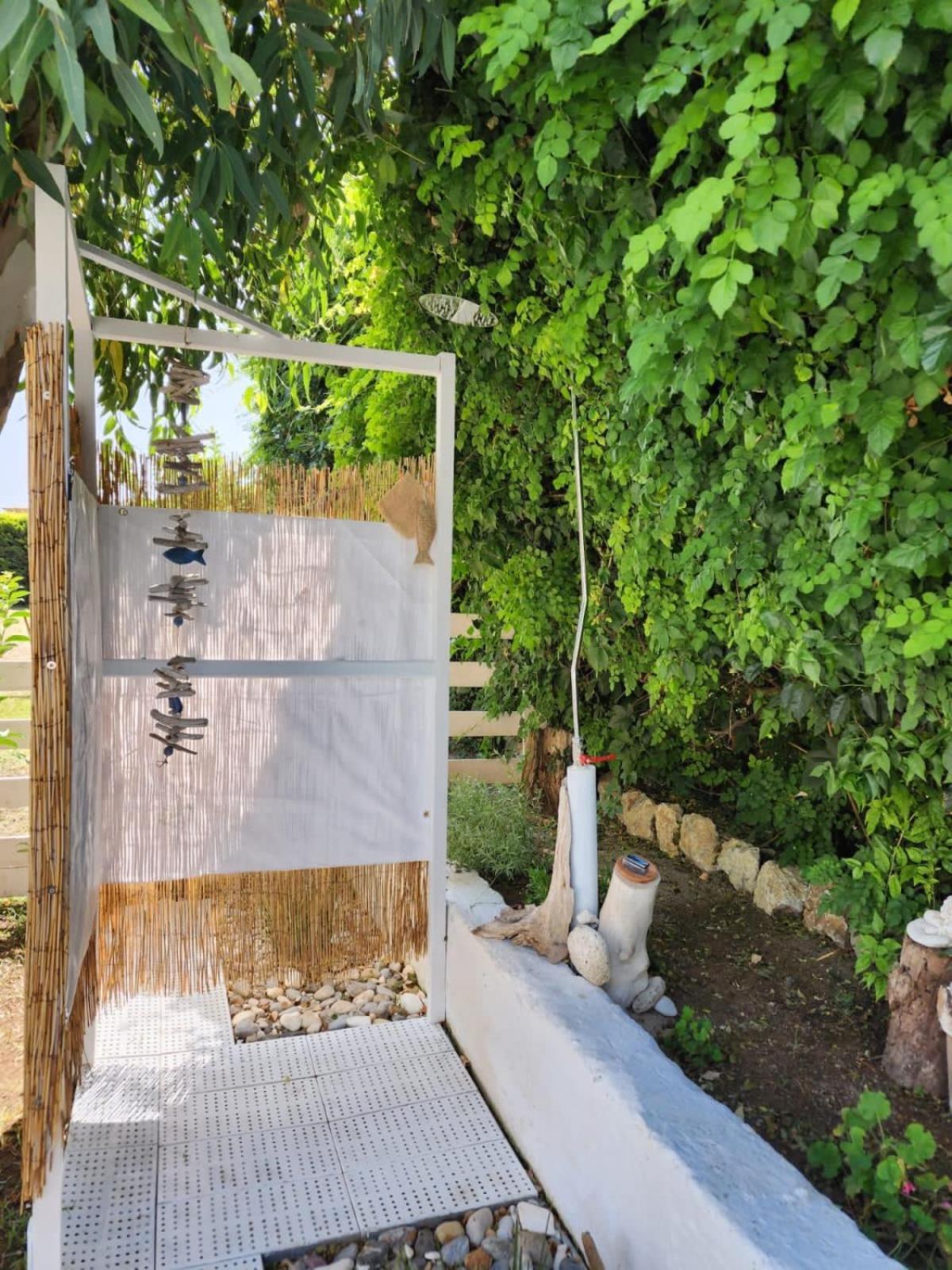 Under The Vine Garden House *
